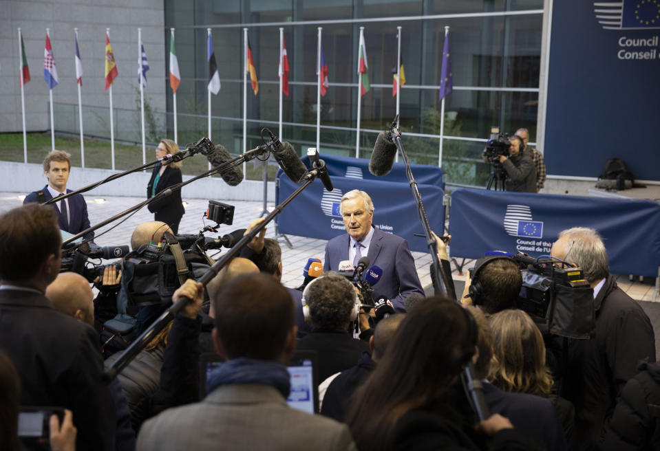 European Union chief Brexit negotiator Michel Barnier speaks with the media as he arrives for a meeting of EU General Affairs ministers, Article 50, at the European Convention Center in Luxembourg, Tuesday, Oct. 15, 2019. European Union chief Brexit negotiator Michel Barnier is in Luxembourg on Tuesday to brief ministers on the state of play for Brexit. (AP Photo/Virginia Mayo)