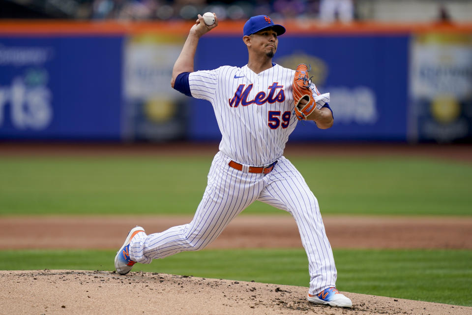 New York Mets starting pitcher Carlos Carrasco (59) throws in the second inning of a baseball game against the Washington Nationals, Wednesday, June 1, 2022, in New York. (AP Photo/John Minchillo)