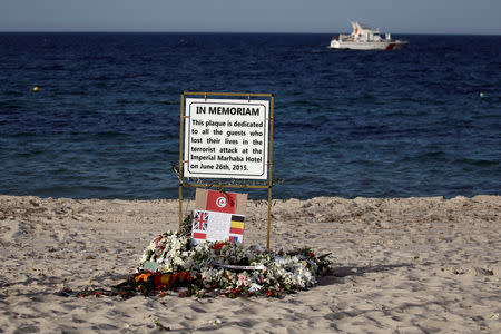 FILE PHOTO: A plaque dedicated to victims is pictured on the beach of the Imperial Marhaba resort, on the first anniversary of an attack by a gunman at the hotel in Sousse, Tunisia June 26, 2016. REUTERS/Zohra Bensemra/File Photo
