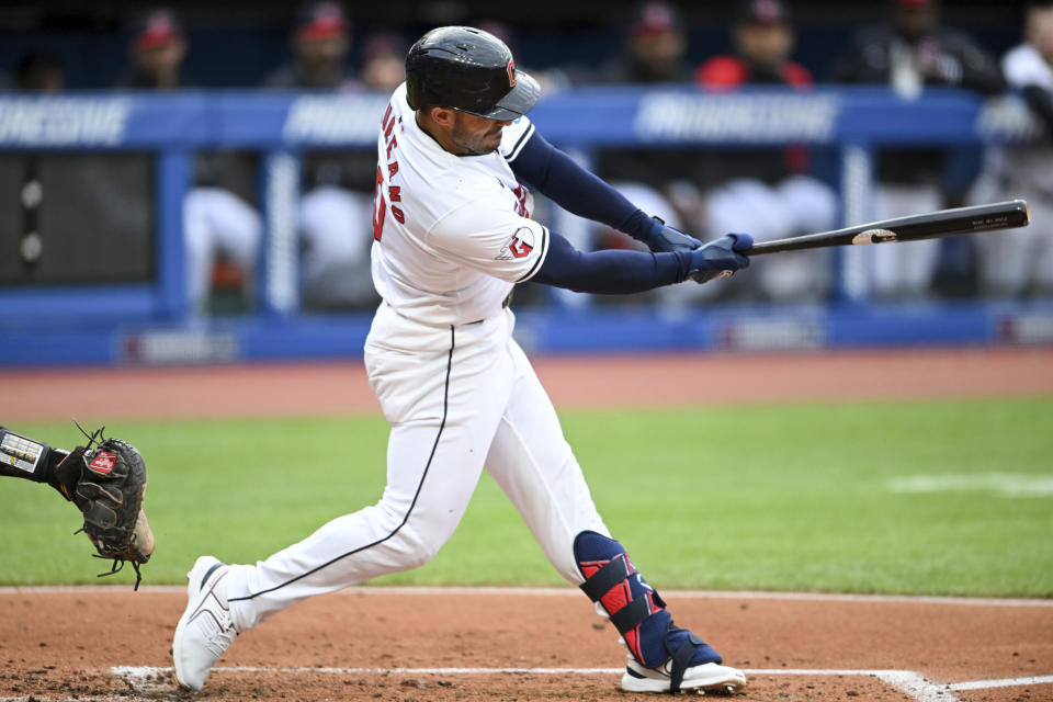 Cleveland Guardians' Ramón Laureano hits an RBI double against the Oakland Athletics during the first inning of a baseball game Saturday, April 20, 2024, in Cleveland. (AP Photo/Nick Cammett)