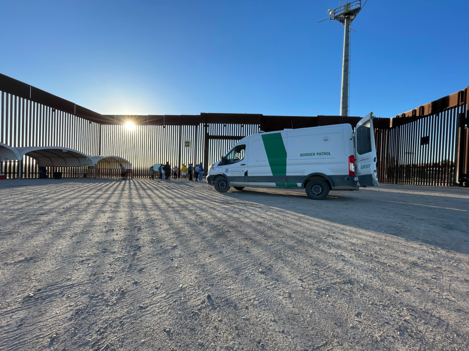 Migrant families and adults are processed by Border Patrol agents near San Luis, Arizona, after receiving water and food from local volunteers. / Credit: Camilo Montoya-Galvez/CBS News