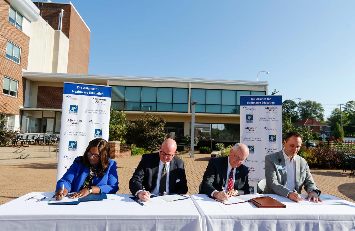 Grenita Lathan, SPS Superintendent, Hal Higdon, chancellor of OTC, Clif Smart, president of MSU, and Max Buetow, president and CEO of CoxHealth sign an agreement to create the Alliance for Healthcare Education at Cox North on Tuesday, Aug. 29, 2023 to tackle workforce shortages of healthcare professionals in the Midwest.