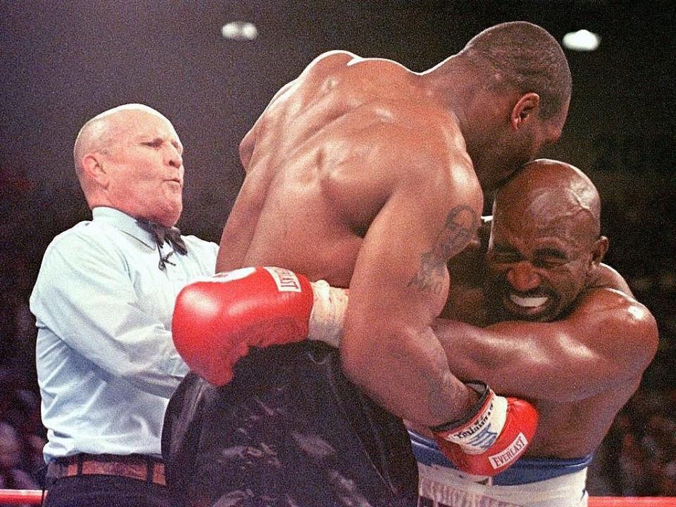 Mike Tyson and Evander Holyfield boxing