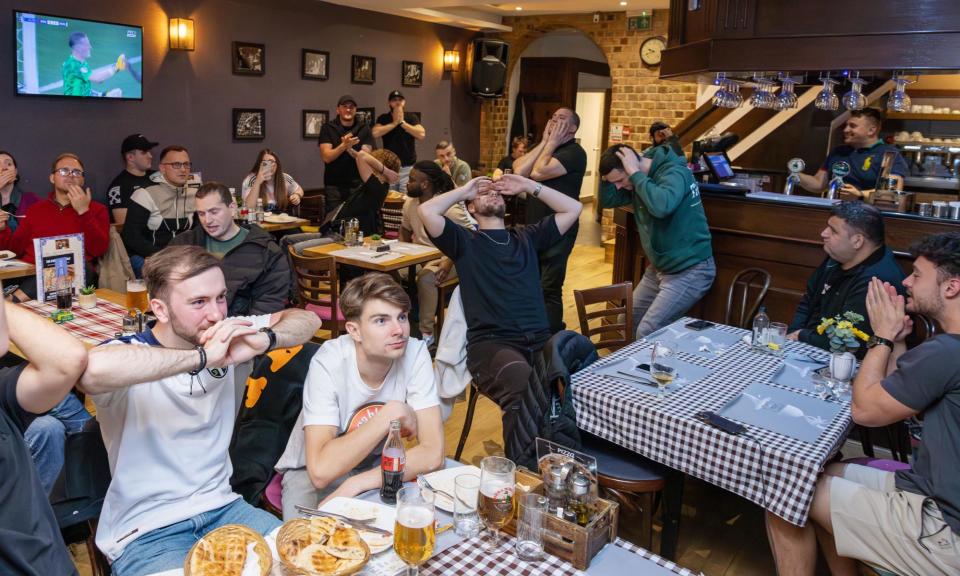 <span>Serbian fans watching the match in the Corner Terrace restaurant in Ealing.</span><span>Photograph: Anna Gordon/The Guardian</span>