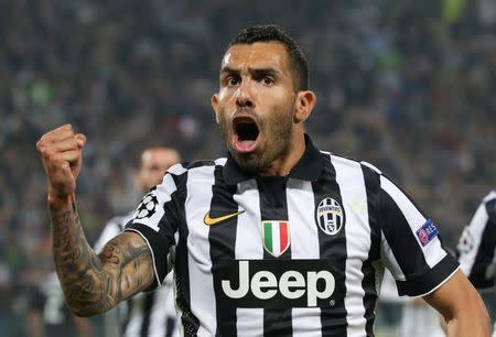 Football - Juventus v Real Madrid - UEFA Champions League Semi Final First Leg - Juventus Stadium, Turin, Italy - 5/5/15. Juventus' Carlos Tevez celebrates scoring their second goal from the penalty spot. Reuters / Stefano Rellandini