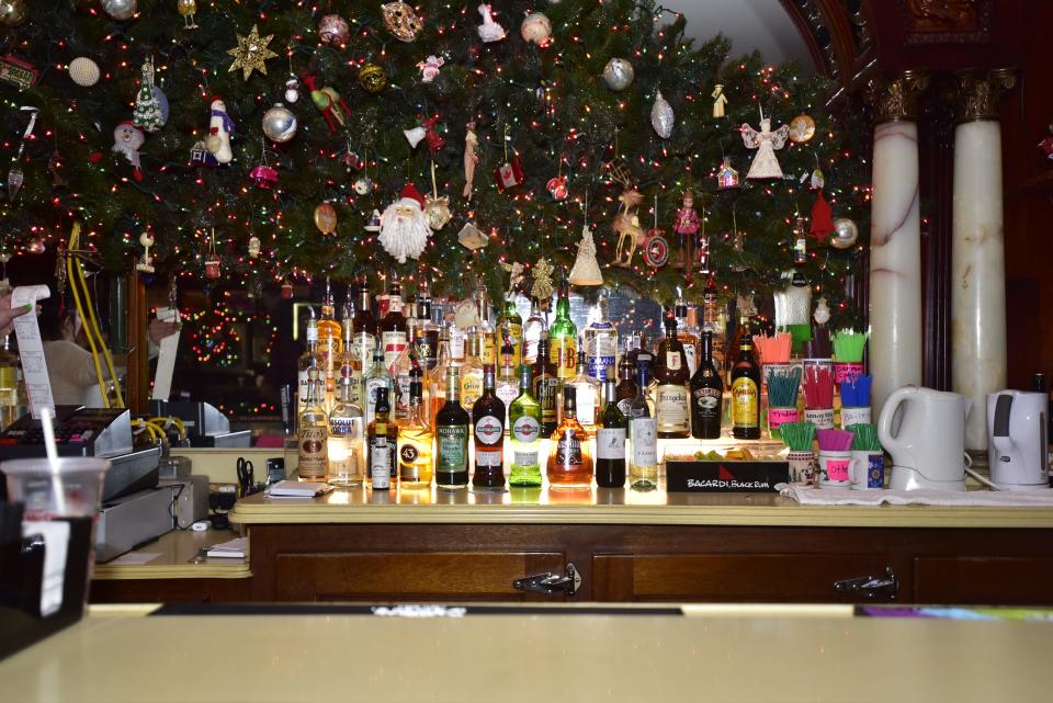 Different kinds of liquor stacked against another at the bar inside the Brass Rail Bar located on Huron Avenue in downtown Port Huron, on Wednesday, Dec. 7, 2022.
