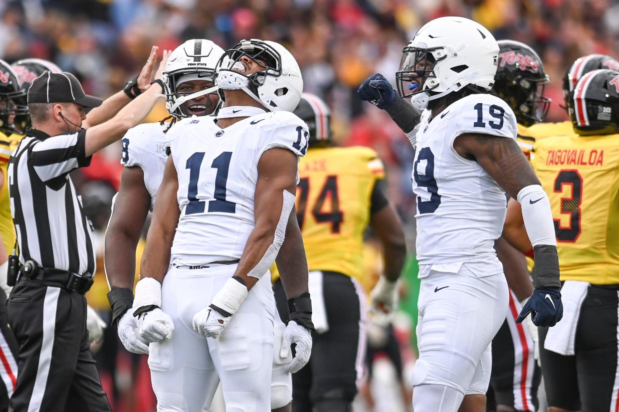 Nov 4, 2023; College Park, Maryland, USA; Penn State Nittany Lions linebacker Abdul Carter (11) celebrates after sacking Maryland Terrapins quarterback Taulia Tagovailoa (3) dung the first half at SECU Stadium. Mandatory Credit: Tommy Gilligan-USA TODAY Sports