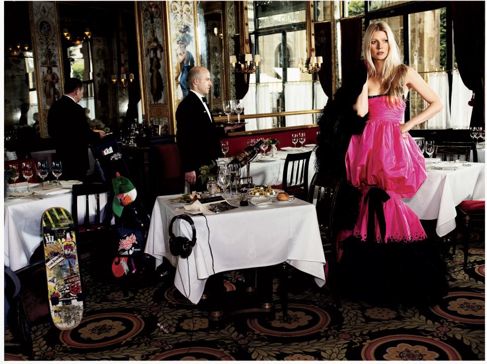 Gwyneth Paltrow photographed at Le Grand V&#xe9;four, Paris, in a fuchsia taffeta dress with ostrich feathers by Chanel Haute Couture.
