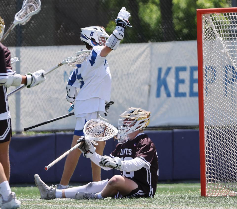 Fremont’s Kaydin Berry (5) celebrates his goal to tie the game in regulation again Davis goalie Hunter Keller in the 6A boys lacrosse state semifinal in Salt Lake City on Wednesday, May 24, 2023. Fremont won in the second overtime. | Jeffrey D. Allred, Deseret News