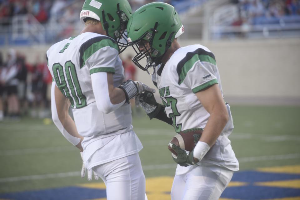 Governors tight end Jett Zabel celebrates with tight end Jackson Edman after a touchdown in Pierre's win over Brookings on Sep. 2, 2022.