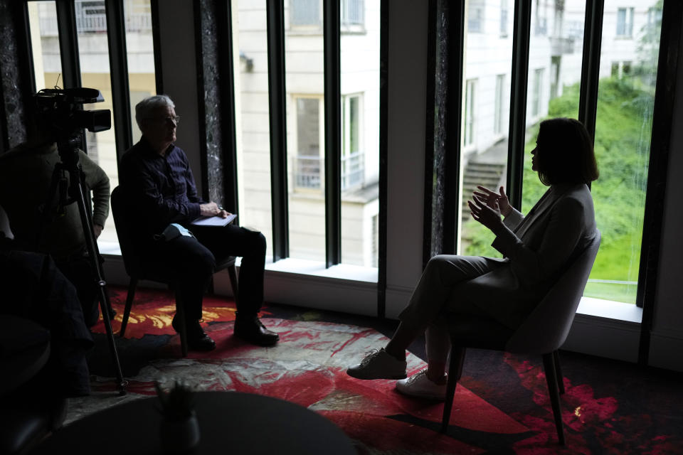 Belarusian opposition leader Sviatlana Tsikhanouskaya, right, talks during an interview with The Associated Press in Brussels, Tuesday, June 22, 2021. Tsikhanouskaya says President Alexander Lukashenko may have miscalculated last month by diverting a Ryanair passenger jet to Minsk, where a dissident journalist aboard was arrested. The exiled novice politician says the incident has galvanized the West against Lukashenko, who had “never crossed this red line before.” (AP Photo/Francisco Seco)