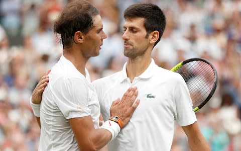 Djokovic and Nadal embrace - Credit: Reuters