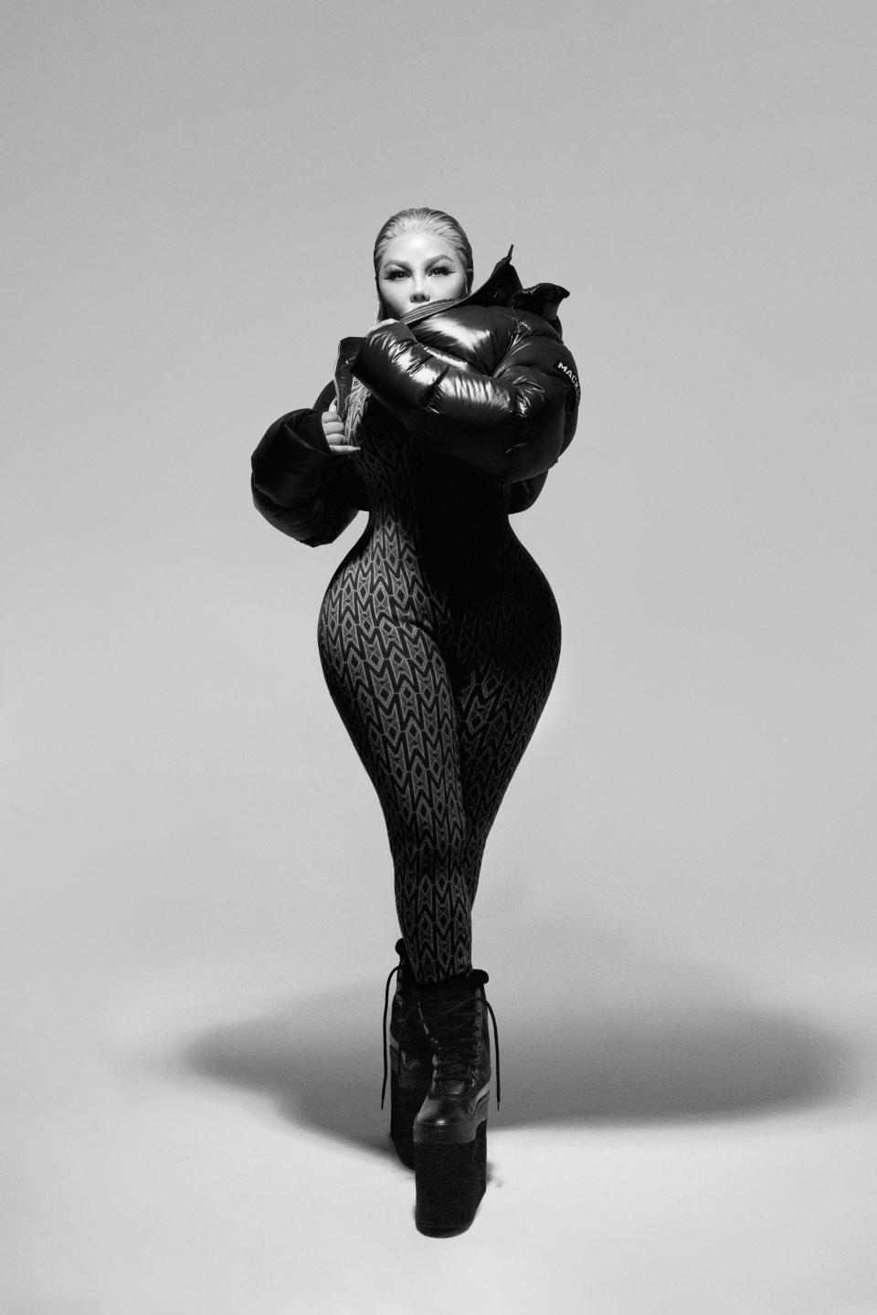 An image of Lil’ Kim in Mackage’s monogram look.