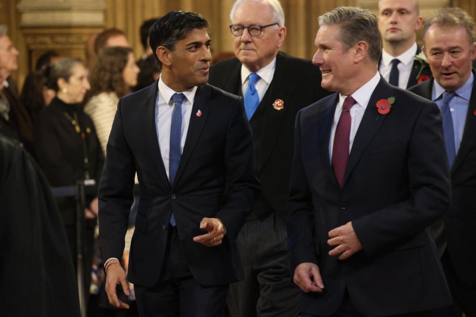 Britain's Prime Minister Rishi Sunak, left, and leader of the opposition Sir Keir Starmer arrive for the State Opening of Parliament in London, on Tuesday, November 7, 2023 (AP)