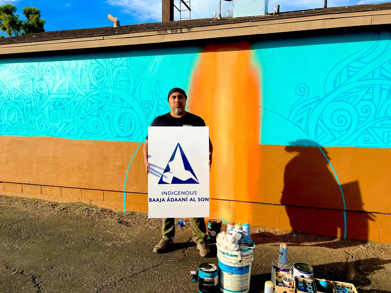 Indigenous Baaja Ádaaní Al Son, a statewide Indigenous political organization, asked Thomas “Breeze” Marcus  to paint a mural about the importance of the Native vote.