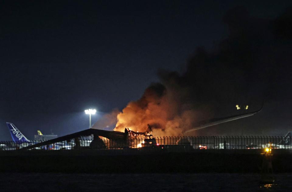 A terrified passenger said he thought he was going to die after his flight collided with a coastguard aircraft (AP)