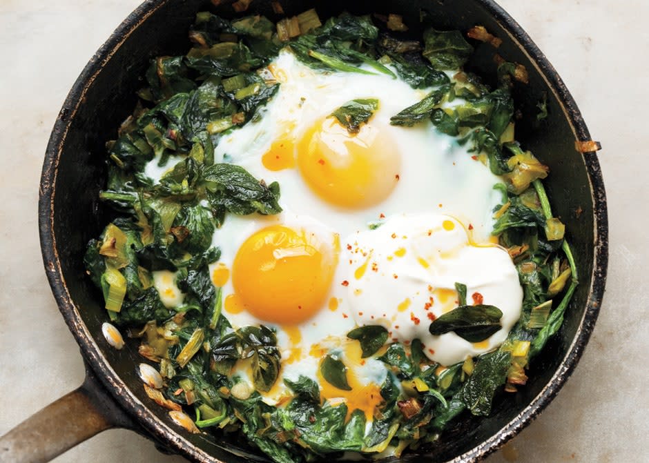 Skillet-Baked Eggs with Spinach, Yogurt, and Chili Oil