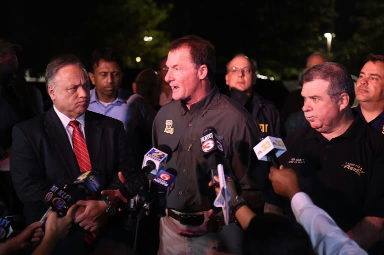 Colonel Mike Edmondson, Superintendent of the Louisiana State Police, speaks with the media outside of Johnston Street Java near the Grand Theatre on July 23, 2015 in Lafayette, Louisiana