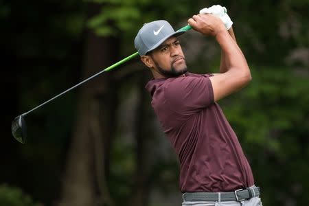 FILE PHOTO: Sep 8, 2018; Newtown Square, PA, USA; Tony Finau plays his shot from the fourth tee during the third round of the BMW Championship golf tournament at Aronimink GC. Mandatory Credit: Bill Streicher-USA TODAY Sports/File Photo