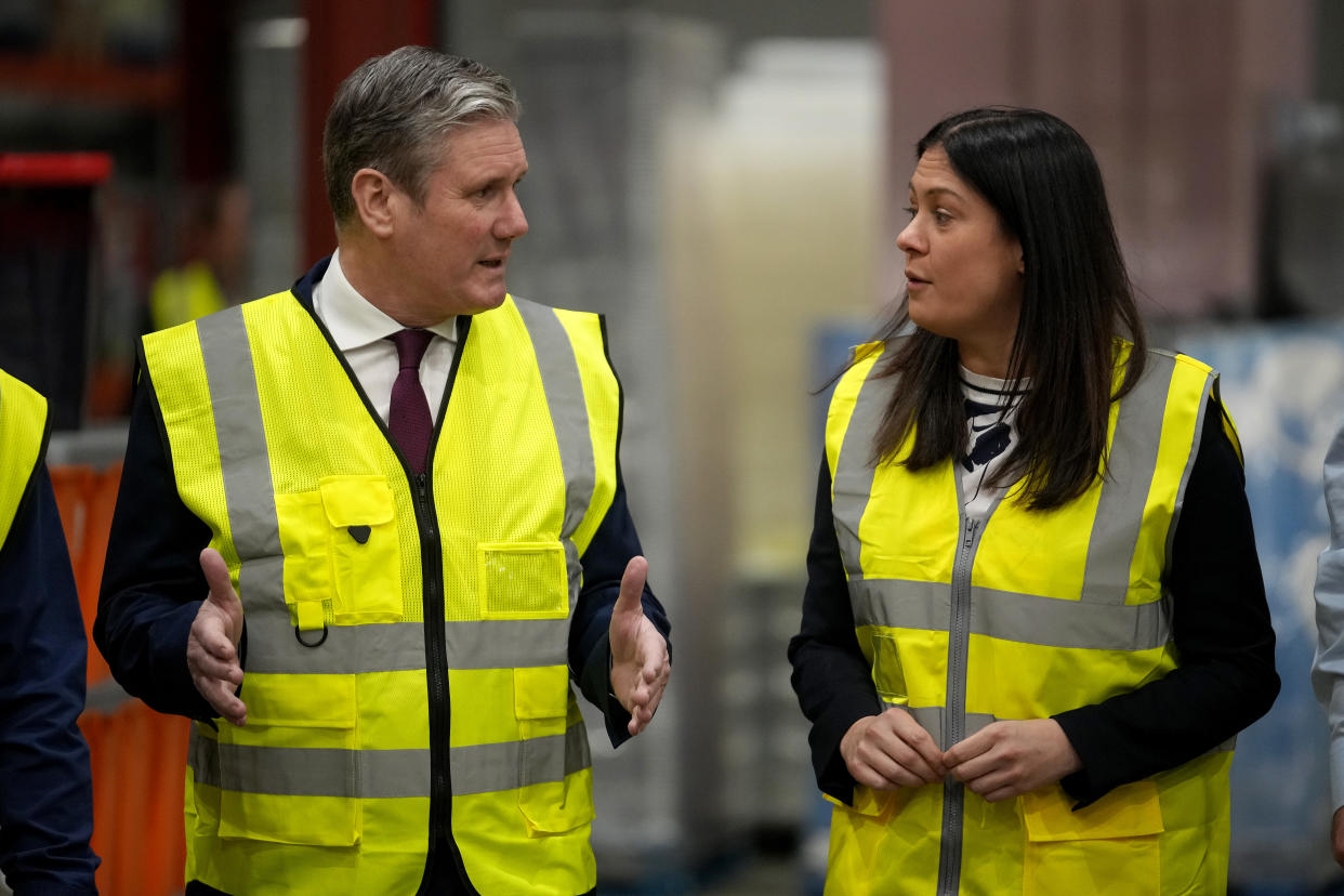 BURNLEY, ENGLAND - FEBRUARY 15:  Labour Party Leader, Sir Keir Starmer and Shadow Secretary of State for Communities and Local Government Lisa Nandy talk to staff during a visit to What More UK Limited on February 15, 2022 in Burnley, England. Labour leader Keir Starmer was joined by Shadow Levelling up Secretary Lisa Nandy MP in Burnley on day two of his three-day tour of England. He is promoting his contract with the British people and setting out Labour's commitment to guaranteeing security, prosperity and respect for all. They visited What More UK, a business manufacturing products from recycled plastic, where they discussed Labour's plans to give people the opportunity to realise their ambitions and build a good life for themselves.   (Photo by Christopher Furlong/Getty Images)