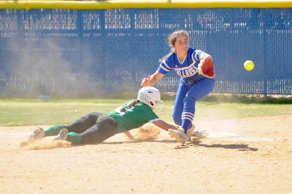 Stamford's Brylee Strand prepares to catch a ball, hoping to tag out a Hamlin baserunner on April 15.