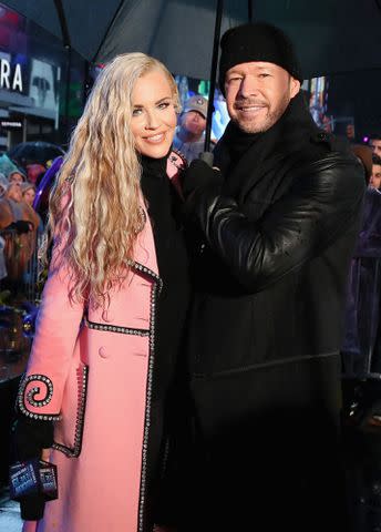 Astrid Stawiarz/Getty Jenny McCarthy and Donnie Wahlberg pose during 'Dick Clark's New Year's Rockin' Eve with Ryan Seacrest' on Dec. 31, 2018, in New York City