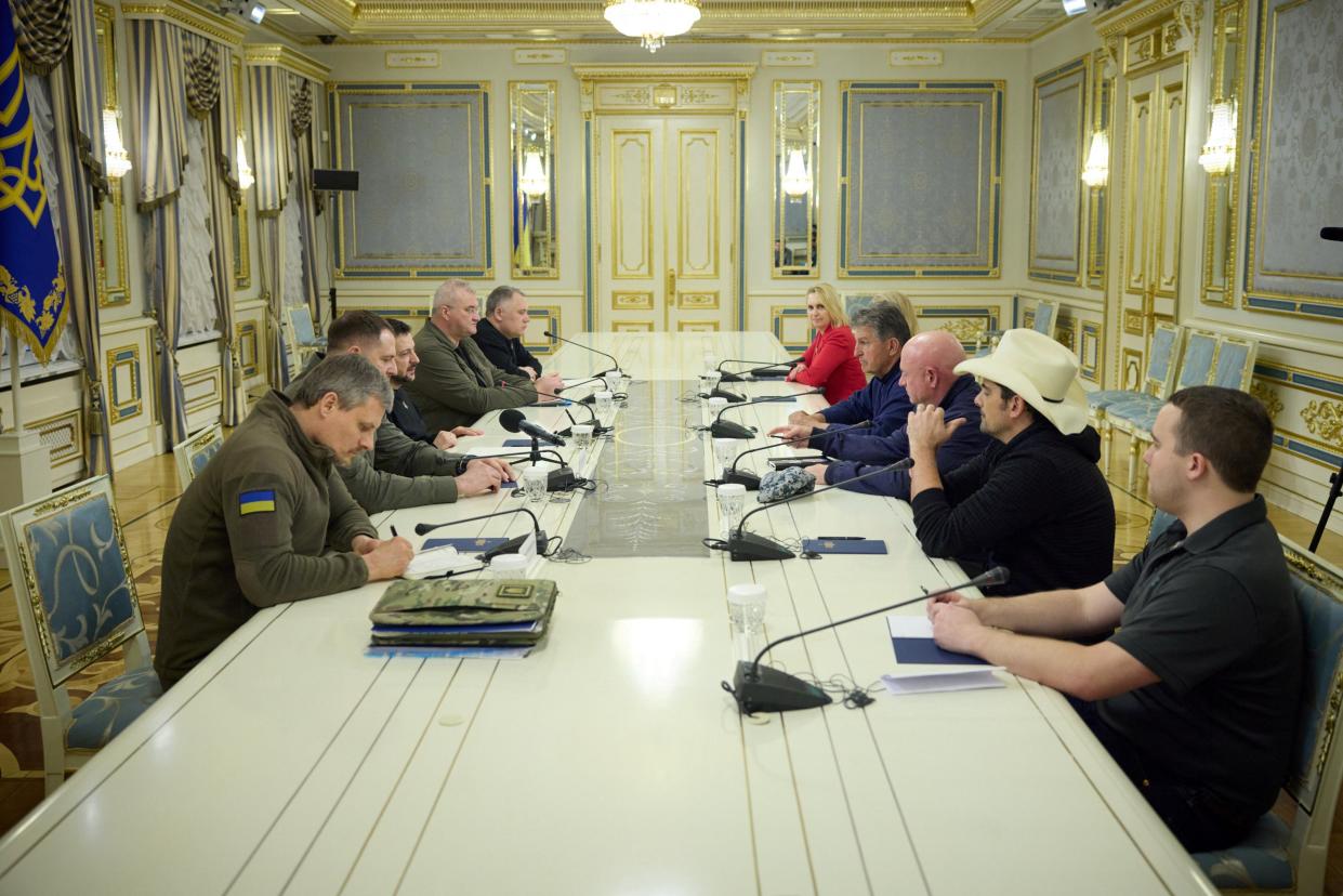 Manchin, Mark Kelly and Murkowski attend a meeting with Zelensky in Kyiv (Reuters)