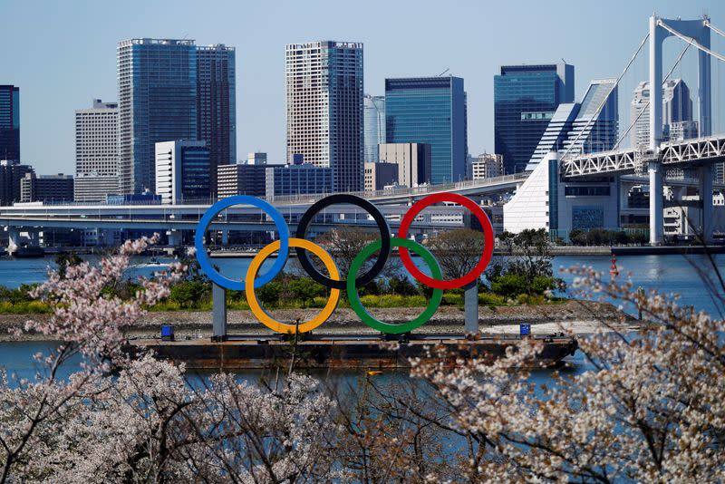 FILE PHOTO: Giant Olympic rings are seen at the waterfront area at Odaiba Marine Park in Tokyo, Japan