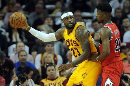 May 6, 2015; Cleveland, OH, USA; Cleveland Cavaliers forward LeBron James (23) works against Chicago Bulls guard Jimmy Butler (21) during the first quarter in game two of the second round of the NBA Playoffs at Quicken Loans Arena. Mandatory Credit: Ken Blaze-USA TODAY Sports