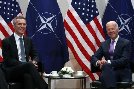 U.S. Vice President Joe Biden meets NATO Secretary General Jens Stoltenberg (L) during the 51st Munich Security Conference at the 'Bayerischer Hof' hotel in Munich February 7, 2015. REUTERS/Michaela Rehle