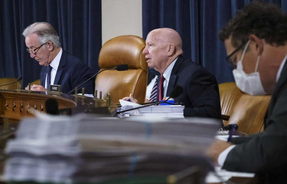 House Ways and Means Committee Chairman Richard Neal, D-Mass., left, and Rep. Kevin Brady, R-Texas, the ranking member, center right, make opening statements as the tax-writing panel continues work on the Democrats' sweeping proposal for tax hikes on big corporations and the wealthy to fund President Joe Biden's $3.5 trillion domestic rebuilding plan, at the Capitol in Washington, Tuesday, Sept. 14, 2021. (AP Photo/J. Scott Applewhite)