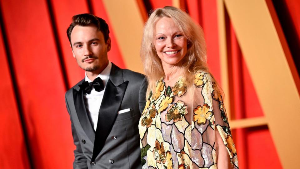 PHOTO: Brandon Thomas Lee and Pamela Anderson arrive at the Vanity Fair Oscar Party, Mar. 10, 2024, in Beverly Hills. (Evan Agostini/Invision/AP)