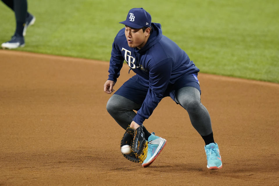 Tampa Bay Rays first baseman Ji-Man Choi takes part in a practice at Globe Life Field as the team prepares for the baseball World Series against the Los Angeles Dodgers, in Arlington, Texas, Wednesday, Oct. 14, 2020. (AP Photo/Eric Gay)