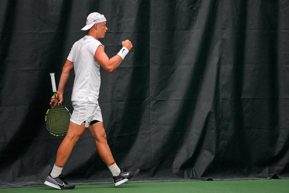 Texas' Cleeve Harper celebrates a point during Saturday's second-round NCAA Tournament win over UCLA at the Texas Tennis Center. The Longhorns will next face Texas A&M in the Sweet 16.