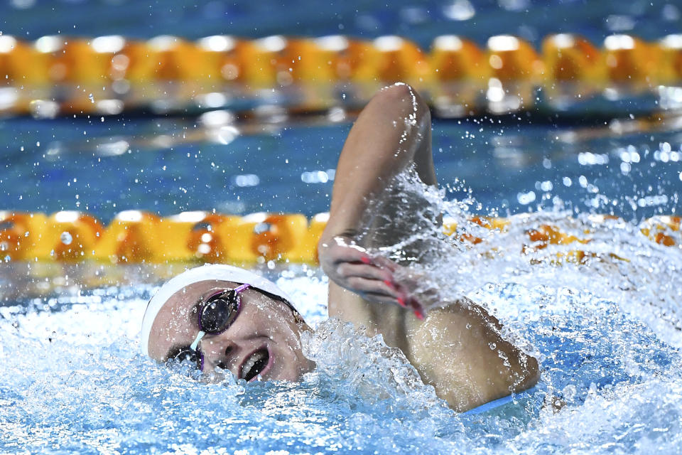 Ariarne Titmus swims in the final of the women's 200m freestyle during the Australian Swimming Trials at the Brisbane Aquatic Centre in Brisbane, Wednesday, June 12, 2024. Titmus set a world record in the women’s 200-meter freestyle on Wednesday at Australia’s Olympic swimming trials Wednesday. (Jono Searle/AAP via AP)