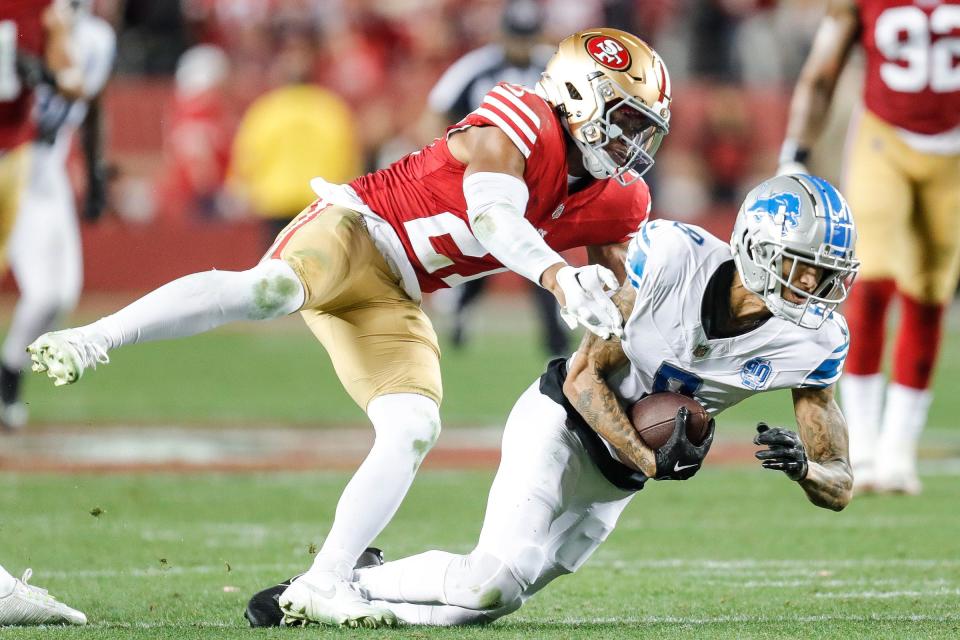 Lions wide receiver Josh Reynolds makes a catch against 49ers safety Ji'Ayir Brown during the second half of the Lions' 34-31 loss in the NFC championship game in Santa Clara, California, on Sunday, Jan. 28, 2024.