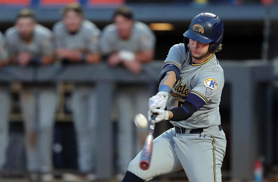 Kent State batter Aidan Longwell (5) connects with a pitch during the seventh inning of an NCAA baseball game at Canal Park, Tuesday, May 9, 2023, in Akron, Ohio.