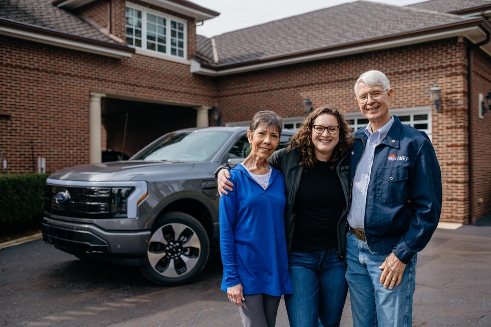 Pam, Megan and Scott Gegesky at the family home on Grosse Ile in early April 2022. They are two of five generations that have worked at Ford Motor Co. over the past 100 years. Her parents worked with the internal combustion engine while Megan is playing a key role during the launch celebration of the 2022 Ford F-150 Lightning on Tuesday.