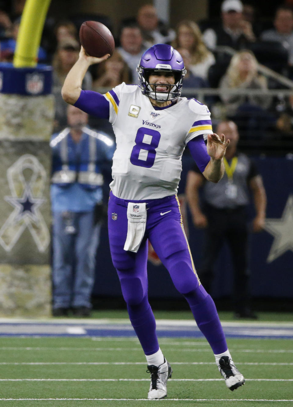 Minnesota Vikings quarterback Kirk Cousins (8) throws a pass during the second half of the team's NFL football game against the Dallas Cowboys in Arlington, Texas, Sunday, Nov. 10, 2019. (AP Photo/Michael Ainsworth)