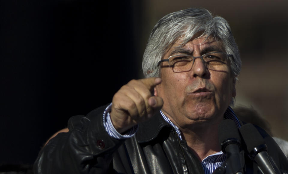 Union leader Hugo Moyano speaks to people gathered for a protest at Plaza de Mayo in Buenos Aires, Argentina, Wednesday, June 27, 2012. A strike and demonstration called by union leader Moyano demands steps that would effectively reduce taxes on low-income people, among other measures. (AP Photo/Natacha Pisarenko)