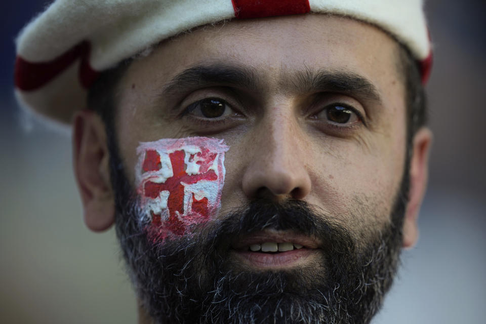 A supporter of Georgia rugby team attend the Rugby World Cup Pool C match between Fiji and Georgia at the Stade de Bordeaux in Bordeaux, France, Saturday, Sept. 30, 2023. (AP Photo/Thibault Camus)