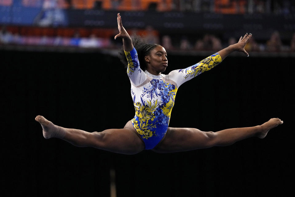 UCLA's Chae Campbell competes in the floor exercise during the NCAA women's gymnastics championships in Fort Worth, Texas, Thursday, April 18, 2024. (AP Photo/Tony Gutierrez)