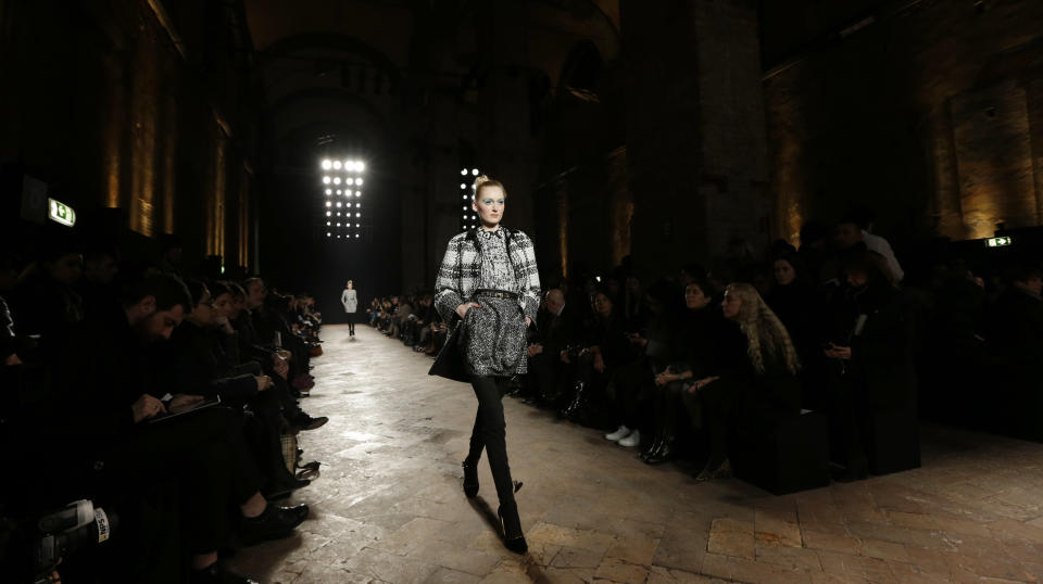 A model wears a creation for Aquilano Rimondi women's Fall-Winter 2013-14 collection, part of the Milan Fashion Week, unveiled in Milan, Italy, Saturday, Feb. 23, 2013. (AP Photo/Luca Bruno)