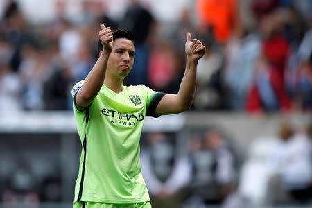 Britain Soccer Football - Swansea City v Manchester City - Barclays Premier League - Liberty Stadium - 15/5/16 Manchester City's Samir Nasri acknowledges fans at the end of the match Action Images via Reuters / Peter Cziborra Livepic