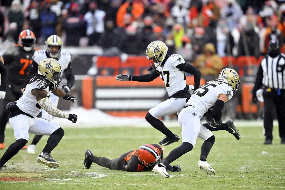 New Orleans Saints safety Daniel Sorensen (25) intercepts a pass intended for Cleveland Browns wide receiver David Bell during the second half of an NFL football game, Saturday, Dec. 24, 2022, in Cleveland. (AP Photo/David Richard)
