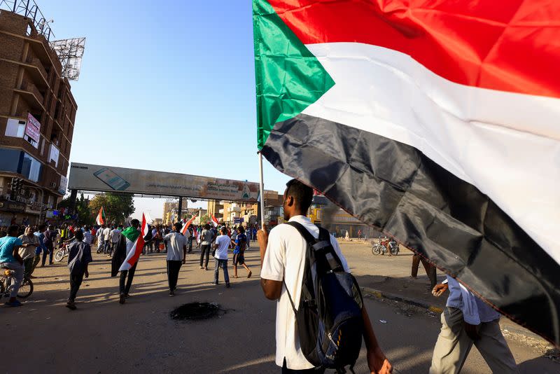 FILE PHOTO: Protesters take part in a rally against military rule, in Khartoum North