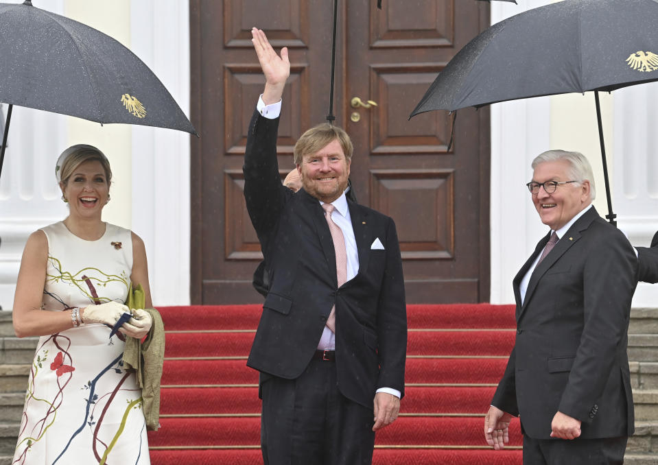 German president Frank-Walter Steinmeier, right, welcomes King Willem-Alexander of the Netherlands and Queen Maxima at the Bellevue palace ion Berlin, Germany, Monday, July 5, 2021. The Royals arrived in Germany for a three-day visit that was delayed from last year because of the coronavirus pandemic. (Bernd Von Jutrczenka/dpa via AP)