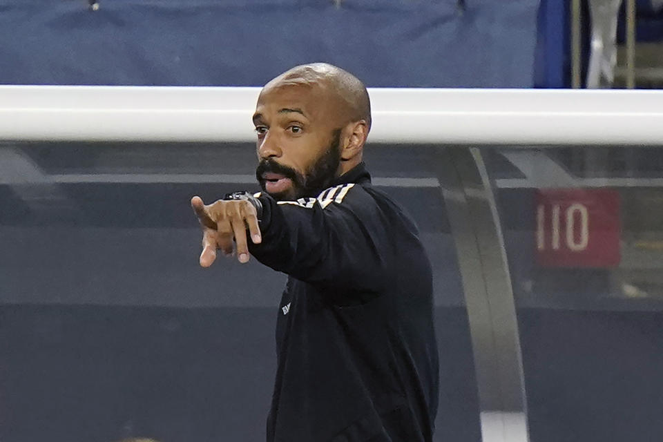 FILE - Montreal Impact head coach Thierry Henry shouts from the bench during the second half of an MLS soccer match against the New England Revolution in Foxborough, Mass., in this Wednesday, Sept. 23, 2020, file photo. Thierry Henry has resigned as coach of Montreal in Major League Soccer after one season on Thursday, Feb. 25, 2021, citing family reasons. (AP Photo/Steven Senne, File)