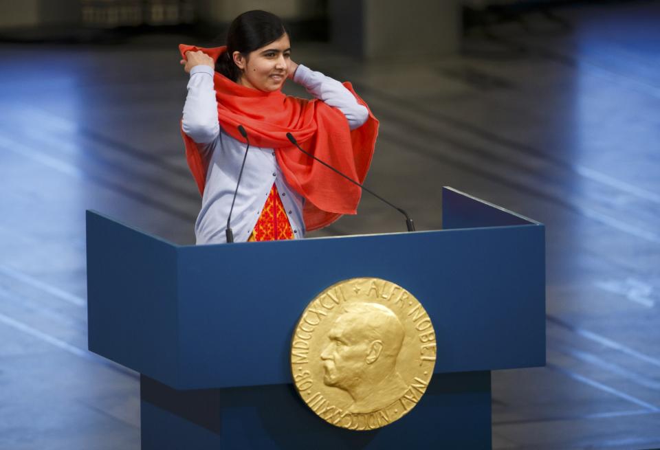 Nobel Peace Prize laureate Malala Yousafzai delivers a speech during the Nobel Peace Prize awards ceremony at the City Hall in Oslo December 10, 2014. Pakistani teenager Malala Yousafzai, shot by the Taliban for refusing to quit school, and Indian activist Kailash Satyarthi received their Nobel Peace Prizes on Wednesday after two days of celebration honouring their work for children's rights. REUTERS/Heiko Junge/NTB Scanpix/Pool (NORWAY - Tags: SOCIETY CIVIL UNREST) NORWAY OUT. NO COMMERCIAL OR EDITORIAL SALES IN NORWAY.