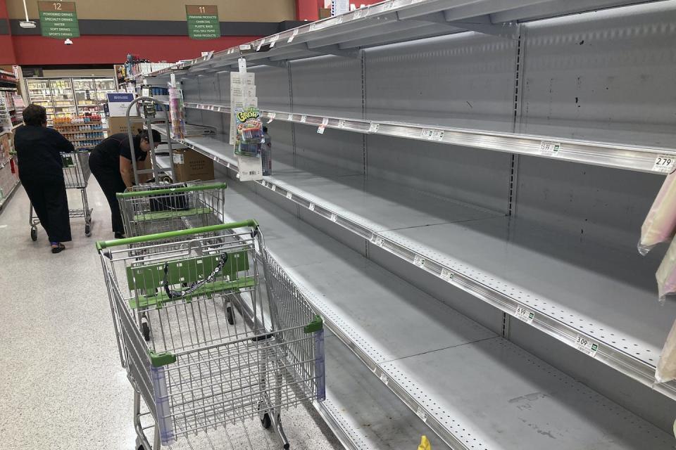 Store shelves in Orlando were bare of bottled water and other storms provisions a few days before Hurricane Ian’s arrival. The crowds can be difficult for some older residents to manage. <a href="https://newsroom.ap.org/detail/TropicalWeatherFlorida/98548e048e214454a16c7c015596a12a/photo" rel="nofollow noopener" target="_blank" data-ylk="slk:AP Photo/John Raoux;elm:context_link;itc:0;sec:content-canvas" class="link ">AP Photo/John Raoux</a>